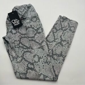 Chaser snake print leggings. Criss cross waist. Size small. NWT retail 75